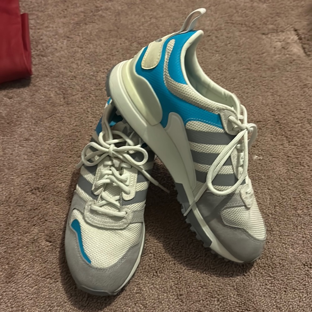 Brand: ADIDAS
Shop ZX 700 HD 'White Singal Cyan'